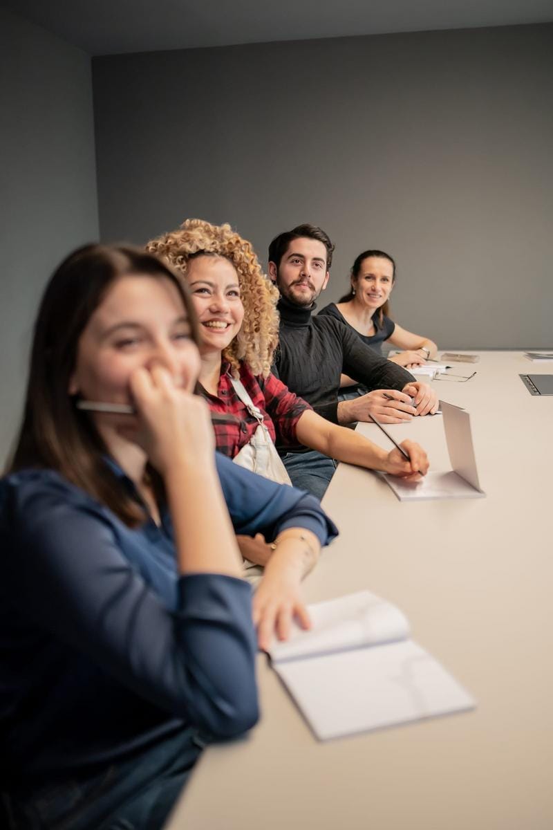 A high-quality digital illustration of a modern online language learning platform showing a vibrant virtual classroom with diverse students engaging in conversation, screenshots of interactive exercises, and cultural tips about Holland in a sleek web interface.